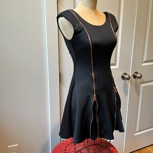 Nasty Gal black knit dress with copper colored zippers. Size small. Poly/spandex